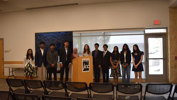 The FutureVitals officer team on stage at the Research Academy closing ceremony