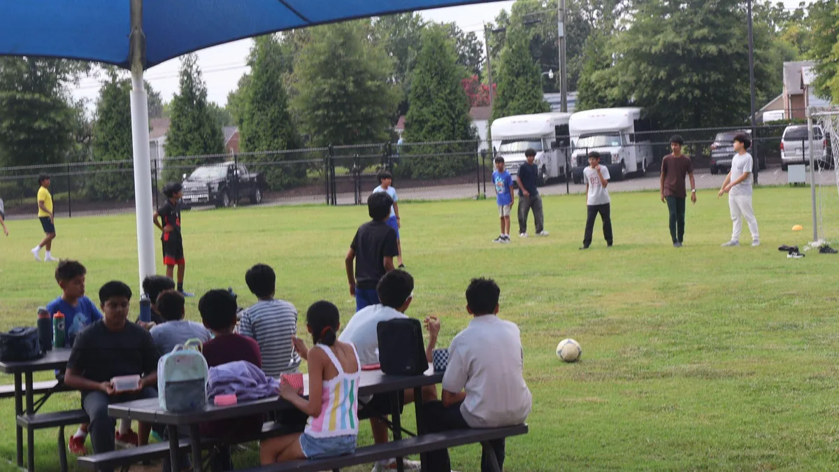 Students on the field during an outdoor session