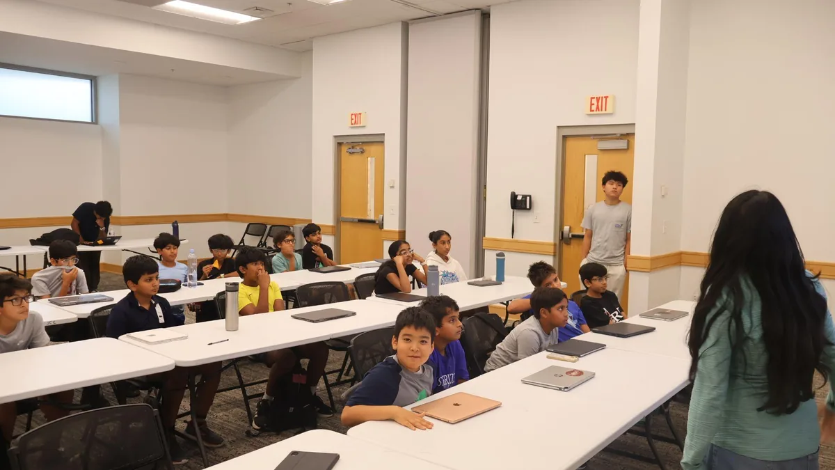 Students listening to a presentation in the classroom
