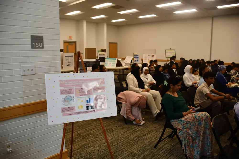 A presenter and audience at the research symposium (1 of 10)