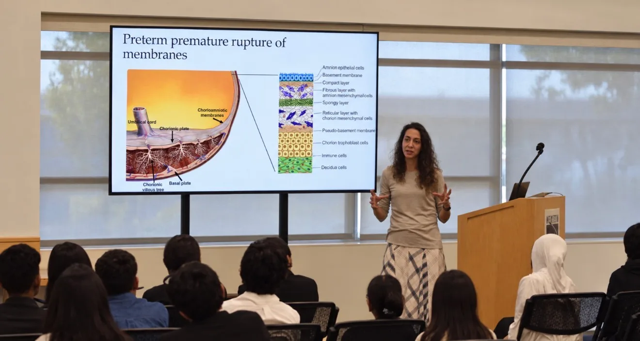 A speaker teaching students about biomedical research