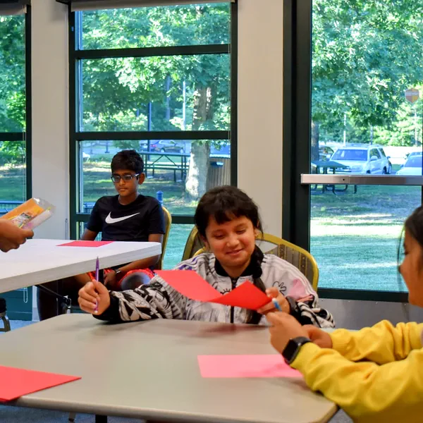 Three students collaborating at a 2026 FutureVitals workshop