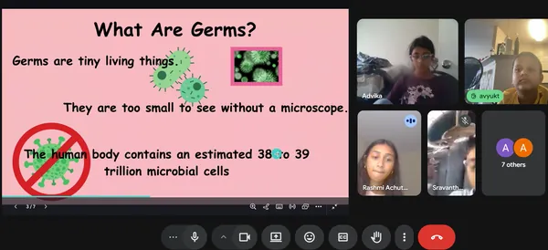 What Are Germs slide presented to campers on a video call