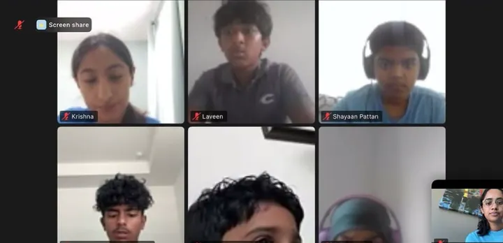 A grid of students on camera during a live session