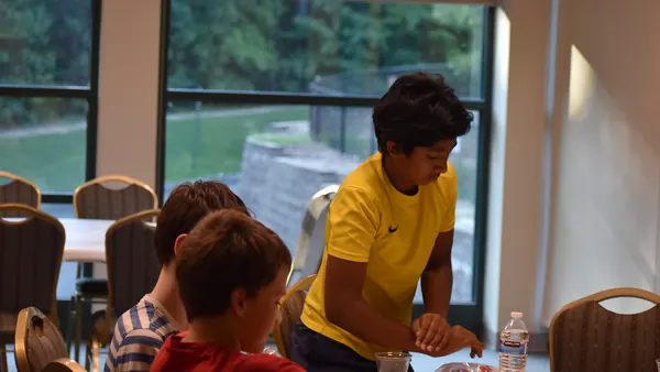 Students at the strawberry DNA extraction workshop